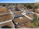 Aerial view of the house, showcasing its backyard and neighborhood setting at 105 Juniper Run, Ocala, FL 34480