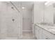 Bathroom with a large walk-in shower and granite countertops at 105 Juniper Run, Ocala, FL 34480