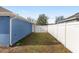 Side yard with gate access and privacy fence at 105 Juniper Run, Ocala, FL 34480