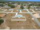 An aerial view showcasing the home's location in a residential neighborhood at 11267 Sw 62Nd Avenue Rd, Ocala, FL 34476