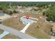 Aerial view of a single-story house with a fenced yard and driveway at 11267 Sw 62Nd Avenue Rd, Ocala, FL 34476