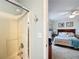 Bathroom with shower/tub combo and view of bedroom at 11267 Sw 62Nd Avenue Rd, Ocala, FL 34476