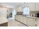 White kitchen with ample counter space and stainless steel appliances at 11267 Sw 62Nd Avenue Rd, Ocala, FL 34476