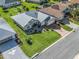 Single-story home with a two-car garage and nicely landscaped yard at 12413 Se 176Th Loop, Summerfield, FL 34491