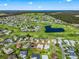 Aerial view of a home near golf course at 12413 Se 176Th Loop, Summerfield, FL 34491