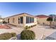 Exterior view showing patio and sunroom at 1341 Lajolla Cir, The Villages, FL 32159