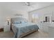 Spacious main bedroom with a king-size bed and ample closet space at 1341 Lajolla Cir, The Villages, FL 32159