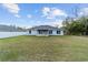 Wide view of the backyard highlights the vast green space at 15065 Se 93Rd Ave, Summerfield, FL 34491