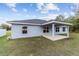 Picture of the backyard and patio of the single story home at 15065 Se 93Rd Ave, Summerfield, FL 34491