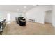 Bright living room featuring a large window, recessed lighting, and a vaulted ceiling at 15065 Se 93Rd Ave, Summerfield, FL 34491