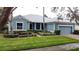 Front view of the house, highlighting its curb appeal with landscaping and driveway at 163 Crepe Myrtle Dr, Groveland, FL 34736