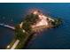 Aerial view of a lighthouse on a small island at night at 1735 Lakeshore Dr, Mount Dora, FL 32757