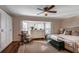 Large main bedroom with ample closet space and bay window at 1735 Lakeshore Dr, Mount Dora, FL 32757