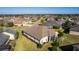 Aerial view of a house and its neighborhood at 1918 Yankee Clipper Run, The Villages, FL 32162