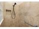 Large walk-in shower with grab bar and tiled walls at 1918 Yankee Clipper Run, The Villages, FL 32162