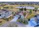 Aerial view of house with circular driveway and landscaping at 2010 Allure Loop, The Villages, FL 32162