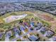 Aerial view showcasing home's location in golf course community at 2010 Allure Loop, The Villages, FL 32162