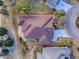 Bird's eye view highlighting home's roofline and landscaping at 2010 Allure Loop, The Villages, FL 32162