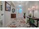 Inviting entryway with decorative accents and tiled flooring at 2010 Allure Loop, The Villages, FL 32162