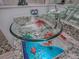 Unique glass vessel sink with fish decor at 2057 Countrywind Ct, The Villages, FL 32162