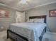 Bedroom with ceiling fan and built-in shelving at 2057 Countrywind Ct, The Villages, FL 32162