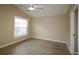 Bright bedroom with wood-look floors and ceiling fan at 2078 Pink Blossom Ct, The Villages, FL 32162