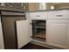 Well-organized kitchen with pull-out drawers and modern design at 2078 Pink Blossom Ct, The Villages, FL 32162