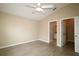 Spacious main bedroom with ensuite bathroom and walk-in closet at 2078 Pink Blossom Ct, The Villages, FL 32162