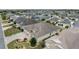 Aerial view of a house and surrounding neighborhood at 2096 Odessa Cir, The Villages, FL 32162