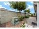 Landscaped backyard with pavers and electrical box at 2096 Odessa Cir, The Villages, FL 32162