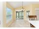 Bright dining area with sliding glass doors to backyard at 2096 Odessa Cir, The Villages, FL 32162