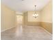 Large dining room with tile floor and neutral-colored walls at 2096 Odessa Cir, The Villages, FL 32162