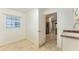 Laundry room with view into kitchen at 2096 Odessa Cir, The Villages, FL 32162