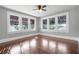 Bright bedroom with hardwood floors and large windows at 211 Cassady St, Umatilla, FL 32784