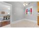 Bright breakfast nook with tile floors and view of dining room at 211 Cassady St, Umatilla, FL 32784