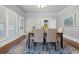 Bright dining room with hardwood floors and a large table at 211 Cassady St, Umatilla, FL 32784