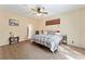 Spacious main bedroom with ample room for a king-size bed at 2187 County Road 243C, Wildwood, FL 34785