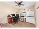 Bright home office features built-in cabinetry and a comfortable workspace at 2187 County Road 243C, Wildwood, FL 34785