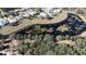 Aerial view of property situated on a tranquil lake at 24308 Belle Mede Dr, Leesburg, FL 34748