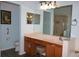 Bathroom featuring vanity area with drawers, a toilet, and glass shower at 24308 Belle Mede Dr, Leesburg, FL 34748