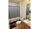 Bathroom with single vanity, toilet and shower/tub combo at 2458 Dunkirk Trl, The Villages, FL 32162