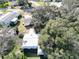 Aerial view of single-Gathering home with metal roof at 25143 Barrow Hl, Leesburg, FL 34748