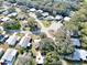 Aerial view of a neighborhood with various homes and landscaping at 25143 Barrow Hl, Leesburg, FL 34748