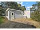 Rear view of a single-story home with AC unit at 25143 Barrow Hl, Leesburg, FL 34748