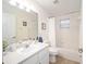 Simple bathroom with a bathtub, toilet, and vanity at 26 Pecan Pass Run, Ocala, FL 34472