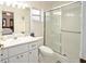 Clean bathroom with a shower/tub combo, toilet, and vanity at 26 Pecan Pass Run, Ocala, FL 34472