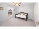 Bright bedroom with a daybed and built-in closet at 26 Pecan Pass Run, Ocala, FL 34472