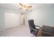 Home office with desk, chair, and closet at 26 Pecan Pass Run, Ocala, FL 34472