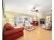 Living room with hardwood floors and bay window at 26 Pecan Pass Run, Ocala, FL 34472