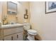 Clean bathroom with a toilet and vanity at 2685 Cr 564, Bushnell, FL 33513